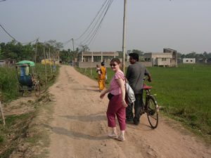 Jacky and security guard leaving school on journey back to guest house