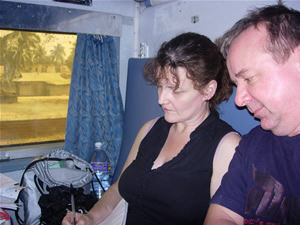 Jacky and Paul working on the revised timetable while on the train to New Jaipur